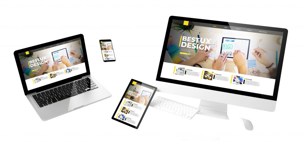 Une production madagasy.com mettant en avant un design UX moderne et réactif, visible sur un ordinateur portable, un smartphone, une tablette et un ordinateur de bureau, illustrant la compatibilité multi-appareils